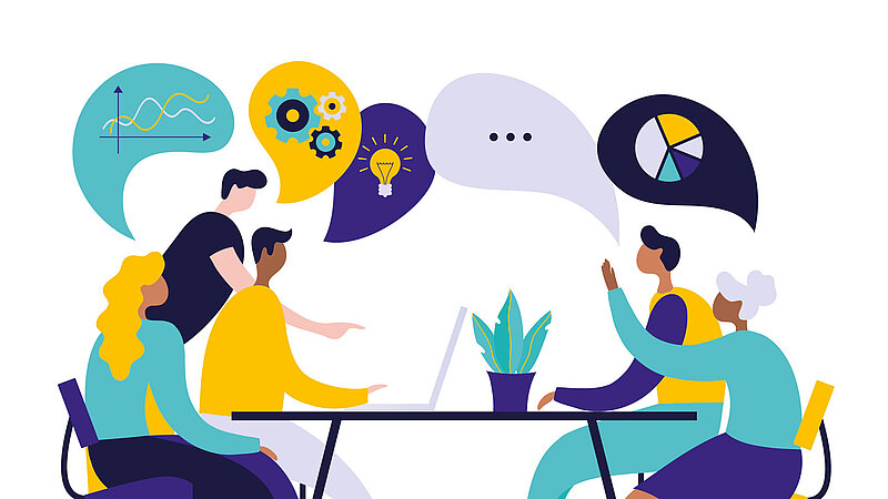 Menschen unterhalten sich an einem Tisch 